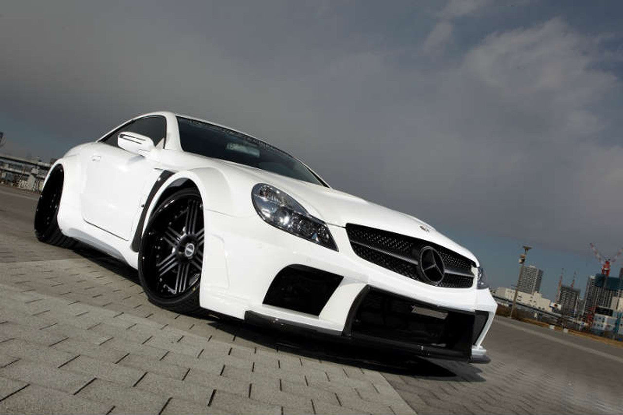 VeilSide Black Fortune 2003-2012 Mercedes SL R230 Wide Body Conversion FRP with CARBON Accents Complete Kit (CFRP/ FRP) Front Bumper, Pair of Side Skirts, Rear Bumper, Front Fenders, Rear Fenders, Rear Spoiler, FRP Hood & Emblems